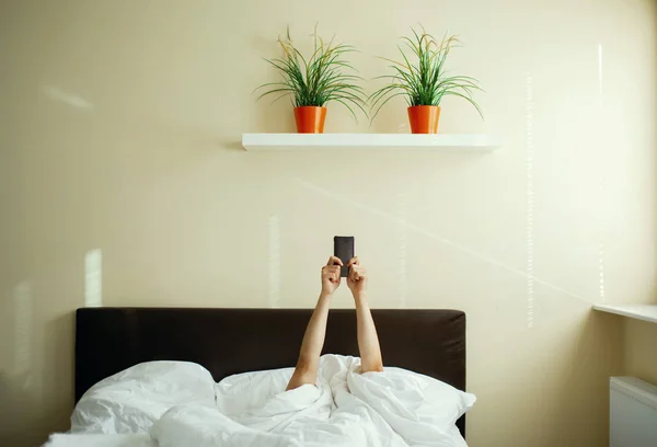 Morning phone in bed