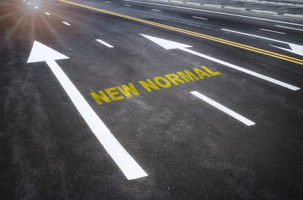 New Normal Words White Arrow Sign Marking Asphalt Road Surface — Stock Photo, Image