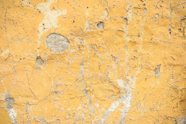 Yellow wall of plaster. Stock Picture