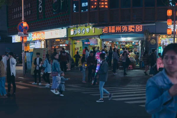 Fuzhou, China - April 05, 2019: Street foods at Daming Lu night — стокове фото