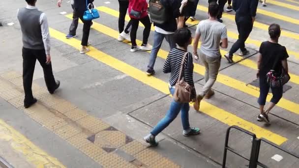 Slow motion of People Crossing the busy street — Stock Video