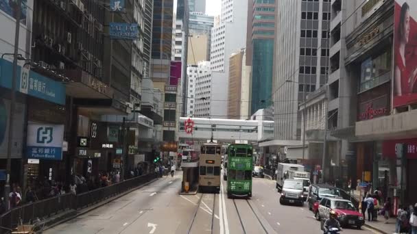 Slow motion of viewing the Hong Kong street scene from the double decker tramway. — Stock Video