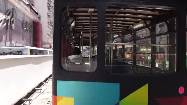 Timelapse / Hyperlapse viewing the Hong Kong street scene from the double decker tramway. — Stock Video