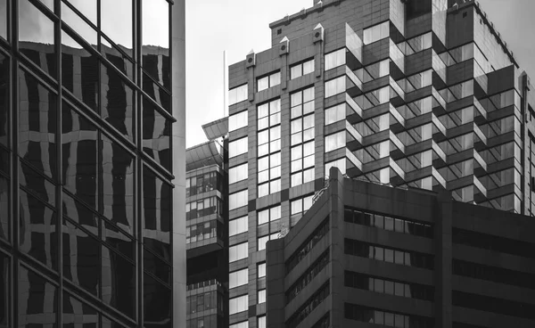 Hong Kong Commercial Building Close Up with B & W color — стоковое фото