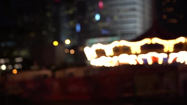 夜のボケで香港ビクトリア港 スローモーション — ストック動画