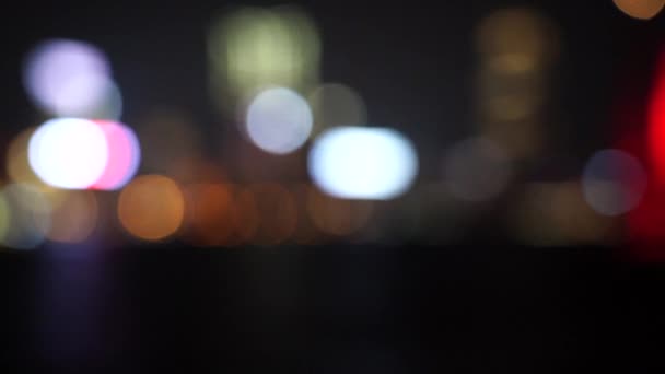 香港维多利亚港晚上在散景 慢动作 — 图库视频影像