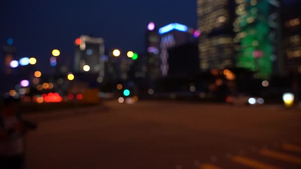 ぼやけて香港の都市の夜 夜の香港交通のボケ眺め スローモーション — ストック動画