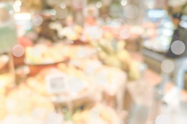 Bokeh ışık, altın renkli arka plan ile Blur Alışveriş merkezi arka plan