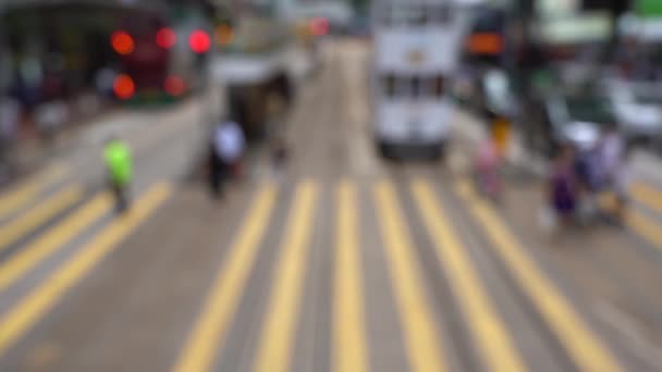 香港の忙しい横断歩道の人々のぼやけた群衆 スローモーション — ストック動画