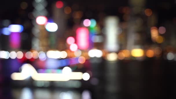 ブラー香港ビクトリアハーバーナイトビュー 市街地の夜景 — ストック動画