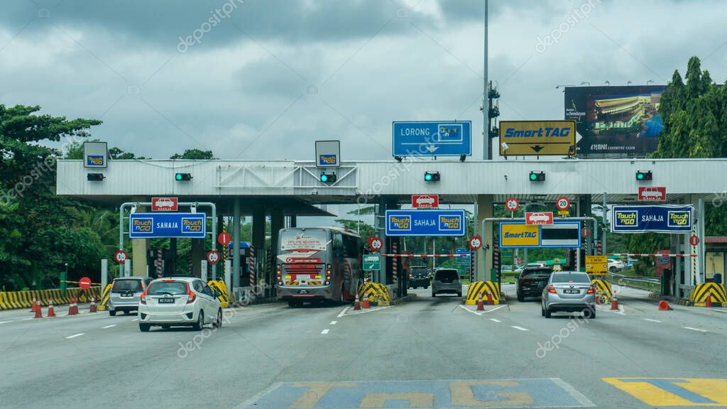Seremban, Malaysia - June 13, 2020: The varoius type of vehicle road toll such as Touch'NGo and Smart Tag at PLUS Highway at Seremban exit road.