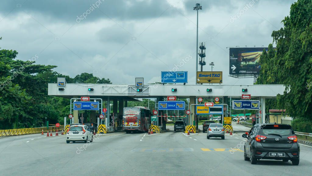 Seremban, Malaysia - June 13, 2020: The varoius type of vehicle road toll such as Touch'NGo and Smart Tag at PLUS Highway at Seremban exit road.