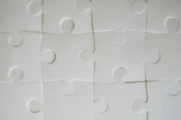 Puzzle pieces put together. — Stock Photo, Image