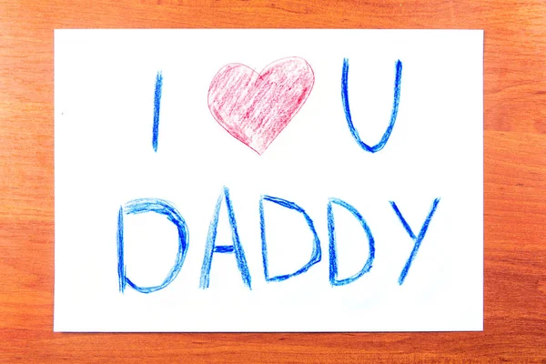 Conceito do dia dos pais. Childs desenho com palavras Eu amo U Papai e coração . Fotos De Bancos De Imagens