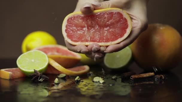 Woman Squeezing Fresh Juicy Grapefruit Hands Fresh Fruits Background Lime — Stock Video
