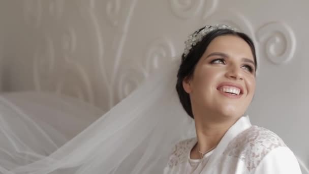 Beautiful and lovely bride in night gown and veil. Wedding morning. Slow motion — Stock Video