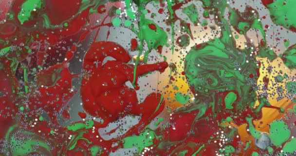 Abstrakt psykedelisk bakgrund. Långsam förflyttning av bläck i en mångfärgad vätska — Stockvideo