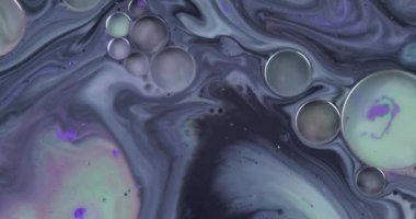 Soyut psychedelic arka plan. Çok renkli bir sıvıdaki mürekvin yavaş hareketi