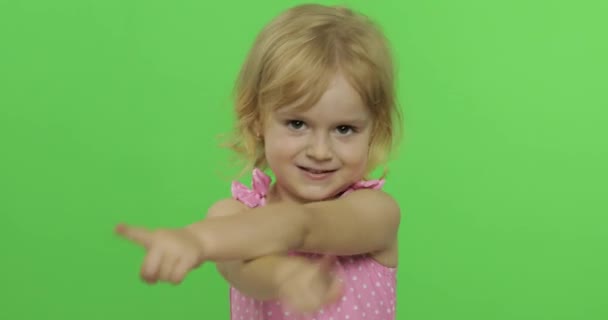 Pretty child emotionally makes faces and smile in pink swimsuit. Chroma Key — Stock Video