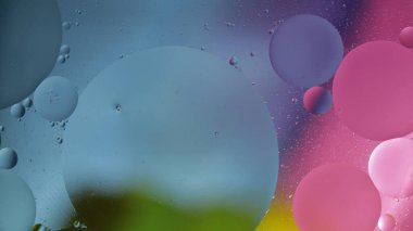 Renkli yağ kabarcıklarının makro yapısı. Kaotik hareket. Soyut çok renkli arkaplan. Desen