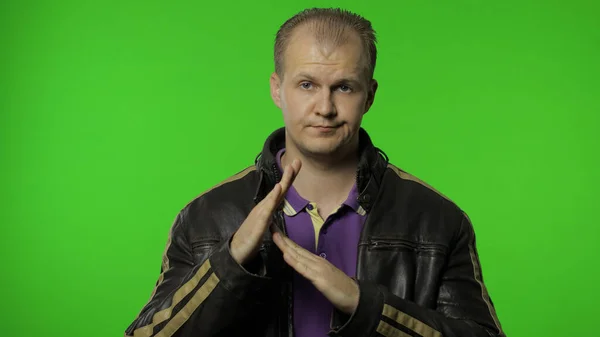 Man showing time out sign. This is limit, enough gesture. Portrait of guy on chroma key background — Stock Photo, Image