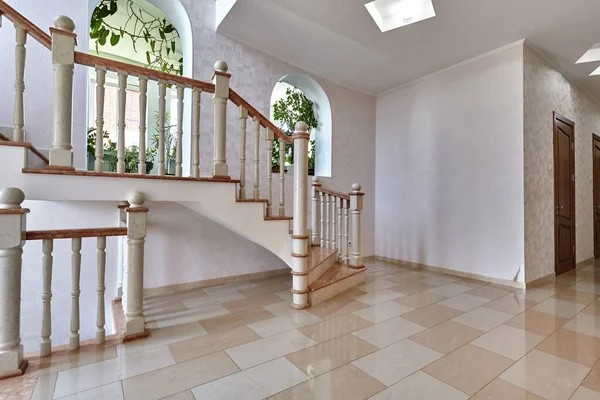 staircase with wrought iron railing