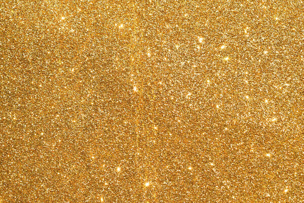 sparkle of golden glitter abstract background