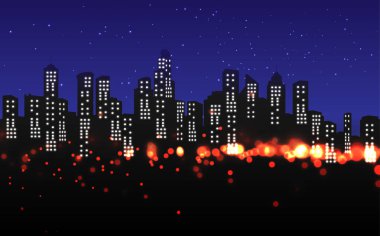 gece şehirde renkli ışık