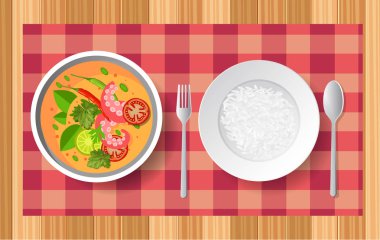  Kalamar Tom Yum ve ahşap masada pirinç