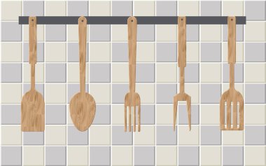 Mutfak odasındaki duvarda tahta kaşık.