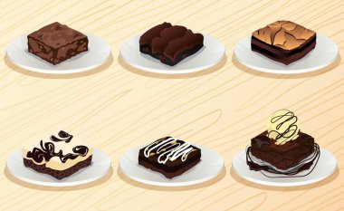 ahşap masa üzerinde plaka içinde brownie