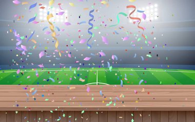futbol sahasında ahşap masa üzerinde konfeti manzara