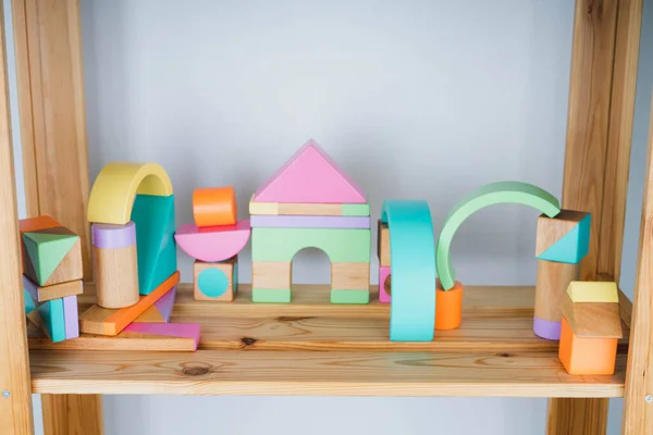 Wooden constructor for children. Colorful toys made of natural materials. Zero waste. Developing game.