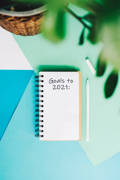 Notebook to write down targets and plans for 2021. List of goals for 2021.