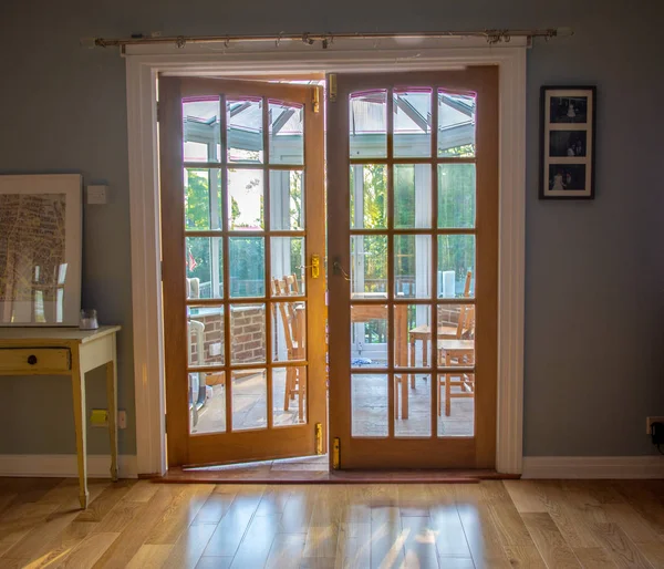 A sunday morning scene at an english home looking out of double Stock Image