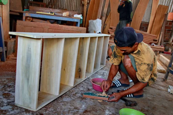 stock image Carpenters work on woodworking machinery at carpentry shops  