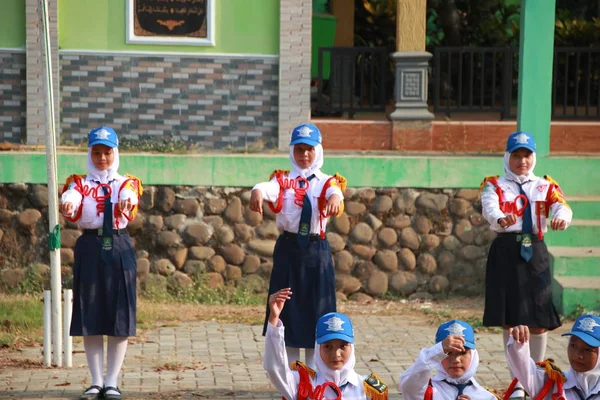 stock image junior high school students take action lines lined neatly and stunningly, with various entertaining movements, Central Java Indonesia, June 22, 2019