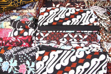 Close look of popular fabrics in Indonesia called Batik, this is made of natural colors clipart