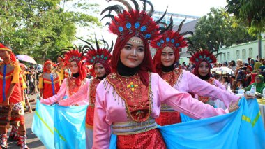 A group of dancers while performing on the street stage, dancing to traditional Javanese dance, Pekalongan Indonesia, 6 October 2019 clipart