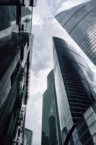 Moscow City skyscrapers in summer in cloudy weather after the rain in perspective