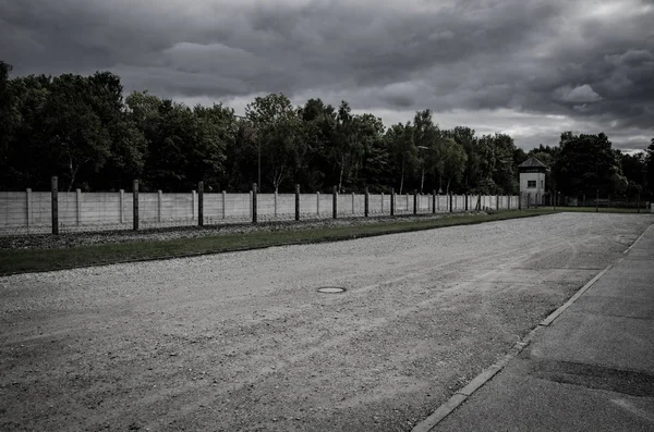 Concentration camp fence. Barbed wire net and electric fencing. Genocide, holocaust, world war, concentration camp themed design elements. — Stock Photo, Image