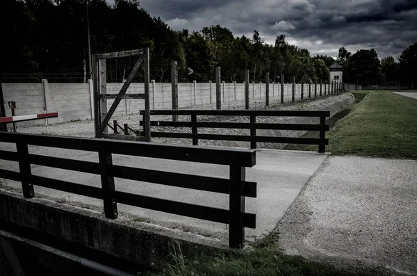 Concentration camp fence. Barbed wire net and electric fencing. Genocide, holocaust, world war, concentration camp themed design elements. — Stock Photo, Image