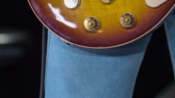 Male Guitarist Conects Cable Input Jack His Electric Guitar — Stock Video