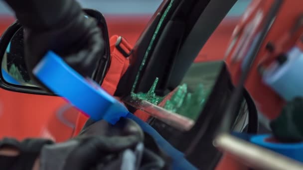 Mechanic Putting Blue Tape Car Window Car Fix Broken Car — Stock Video