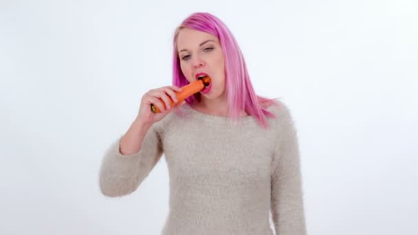 Young Woman Eating Carrot She Likes — Stock Video