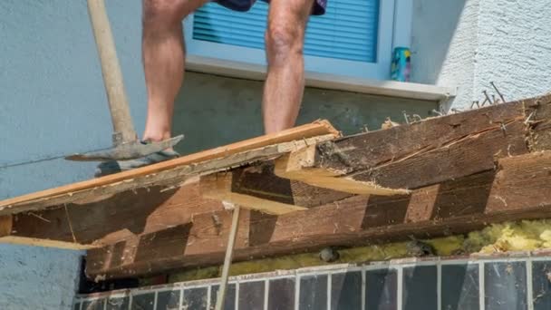 Elder Man Shorts Demolishing Solid Wooden Jutting Roof Hot Summer — Stock Video