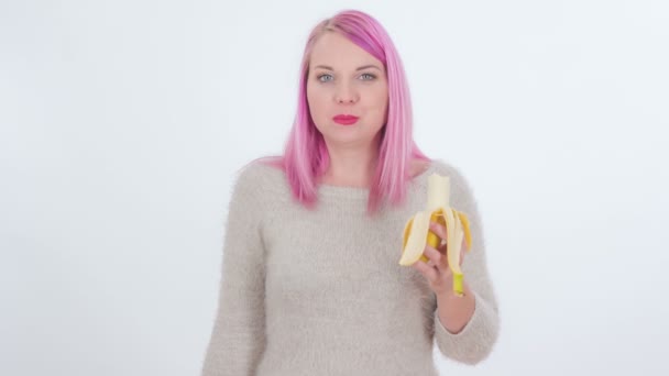 Young Woman Slowly Eating Banana She Really Enjoying — Stock Video