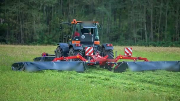 Farmer Sits His Tractor Drives Very Fast Grass Field Cuts — Stock Video