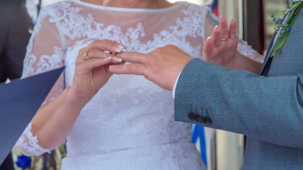Bride Puts Wedding Ring Her Husband Ring Finger Having Nice — Stockvideo