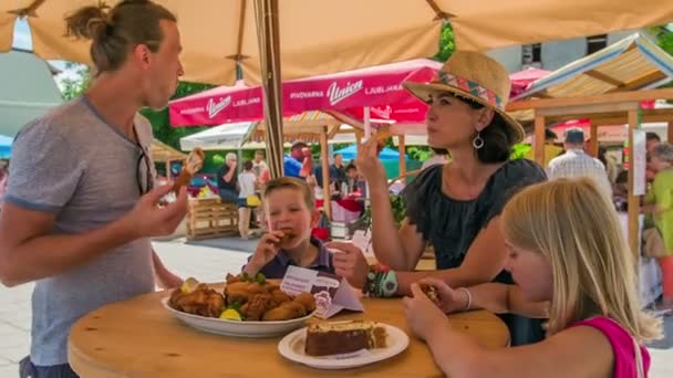 Domzale Slovenia June 2018 Young Family Two Children Eating Lunch — Stock Video